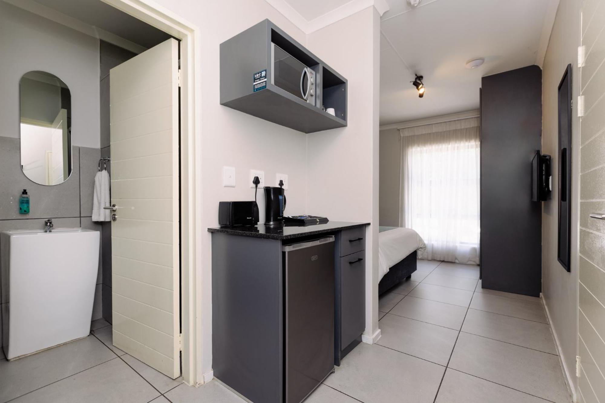 Apartamento Mint Express Melrose View Johannesburgo Habitación foto